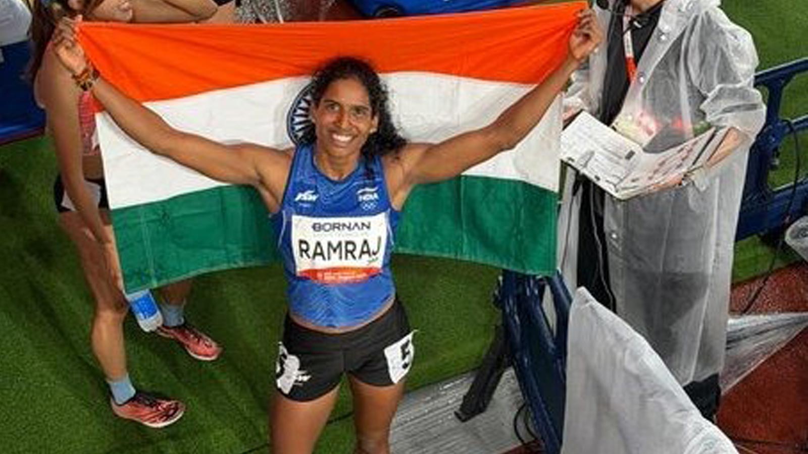 Vithya Ramraj celebrates after winning bronze in the women’s 400m hurdles at the 2026 Asian Games